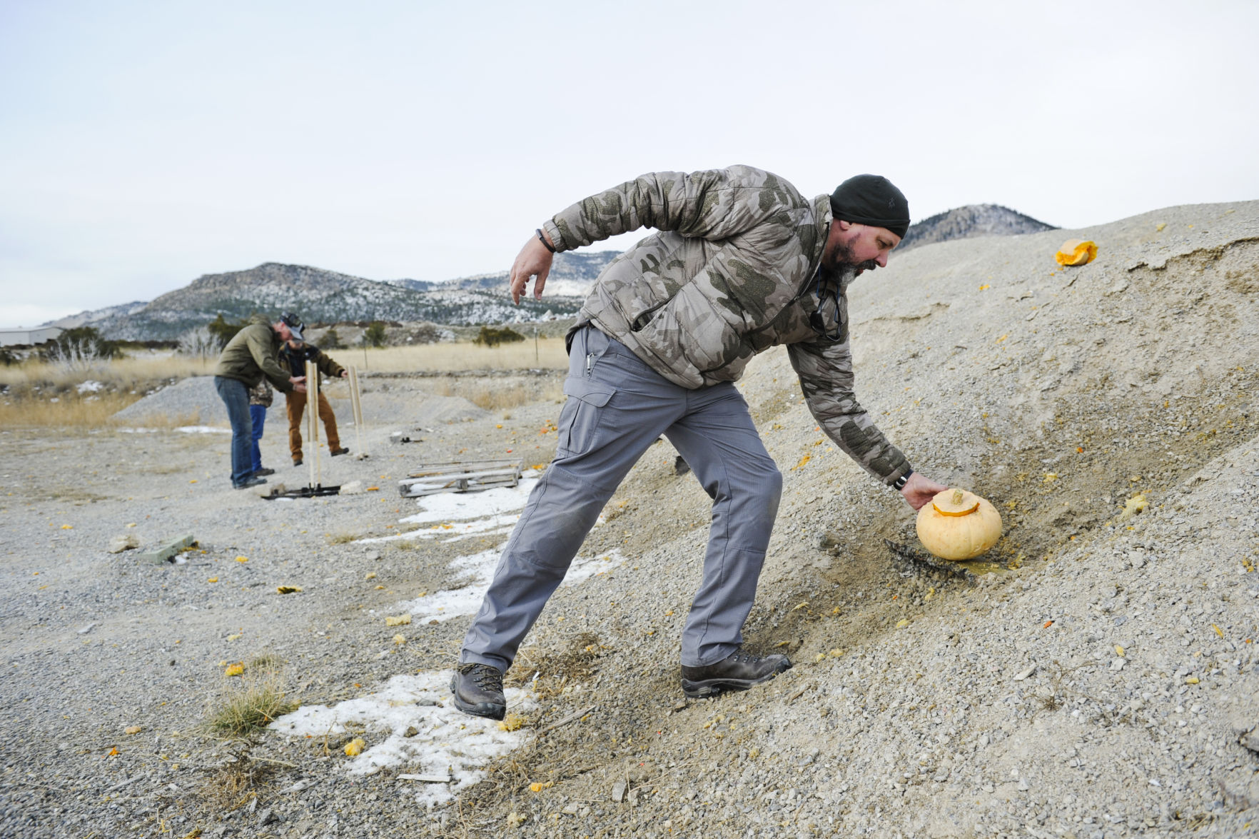 Brett Lutkehus sets out Tannerite filled pumpkins